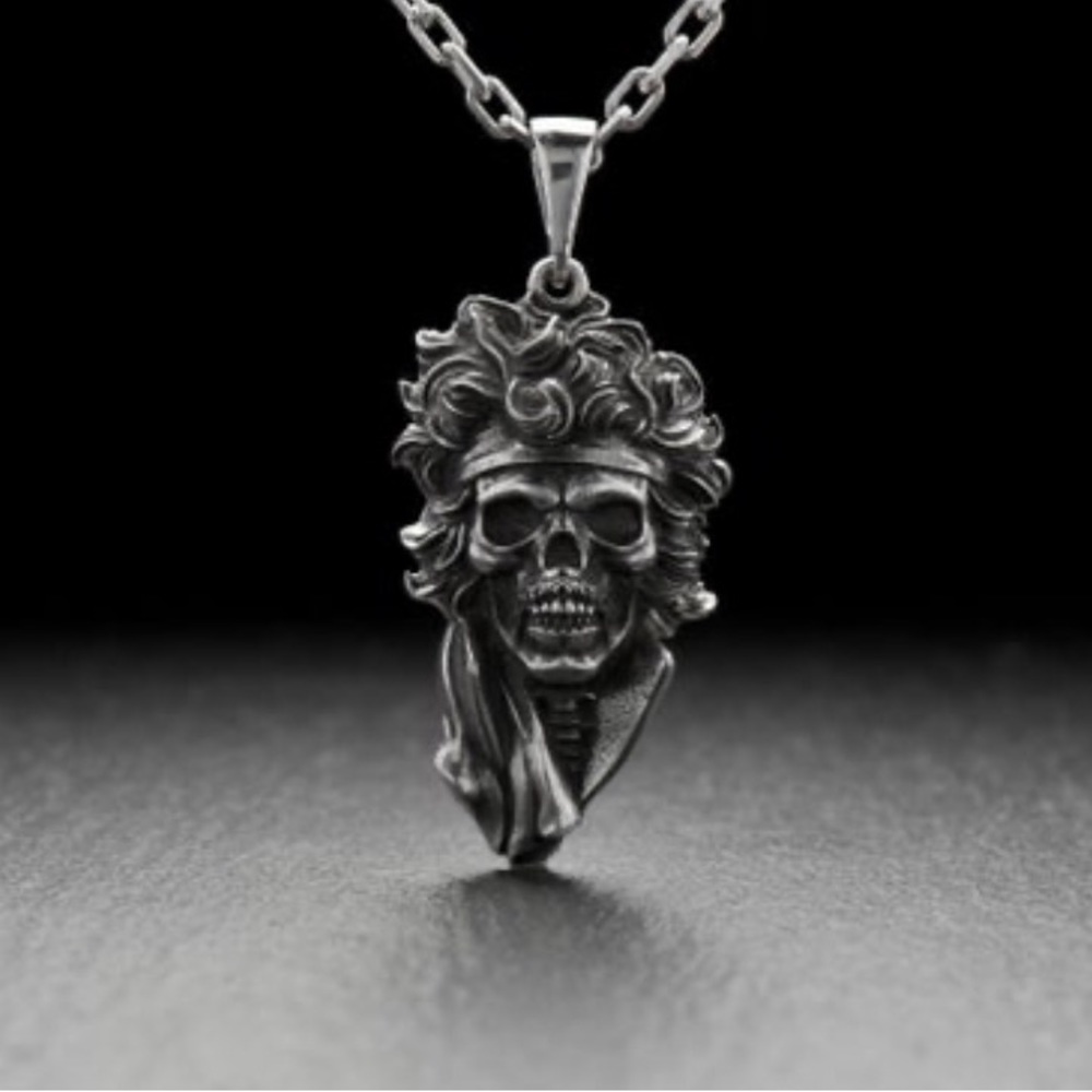 Jimi Hendrix .925 Sterling Silver skull pendant. Two inches by 1 inch.